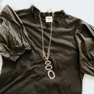 Black puffed renaissance sleeve faux turtleneck